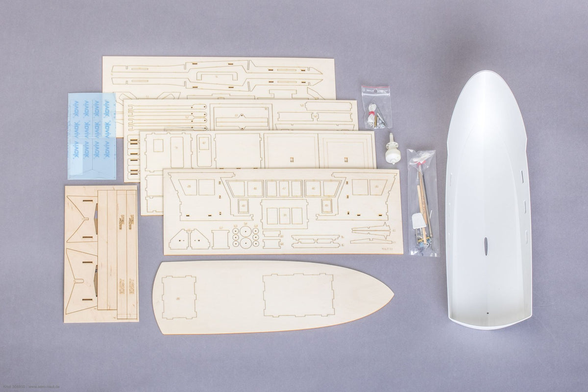 aeronaut Knut RC-Arbeitsschiff Bausatzinhalt mit ABS-Rumpf, gelaserten Holzteilen und Beschlägen
